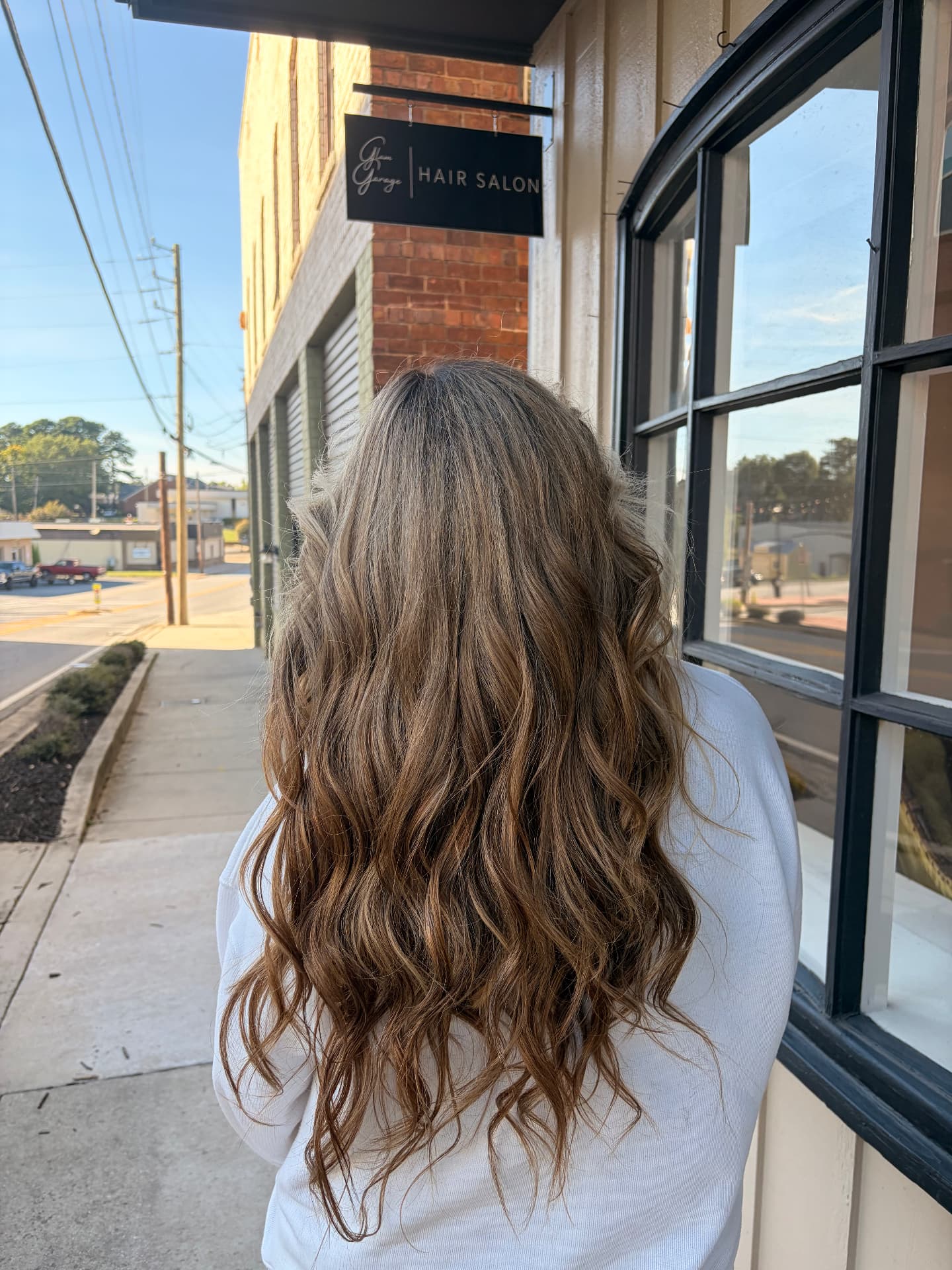 Long dark layered haircut by Lilly