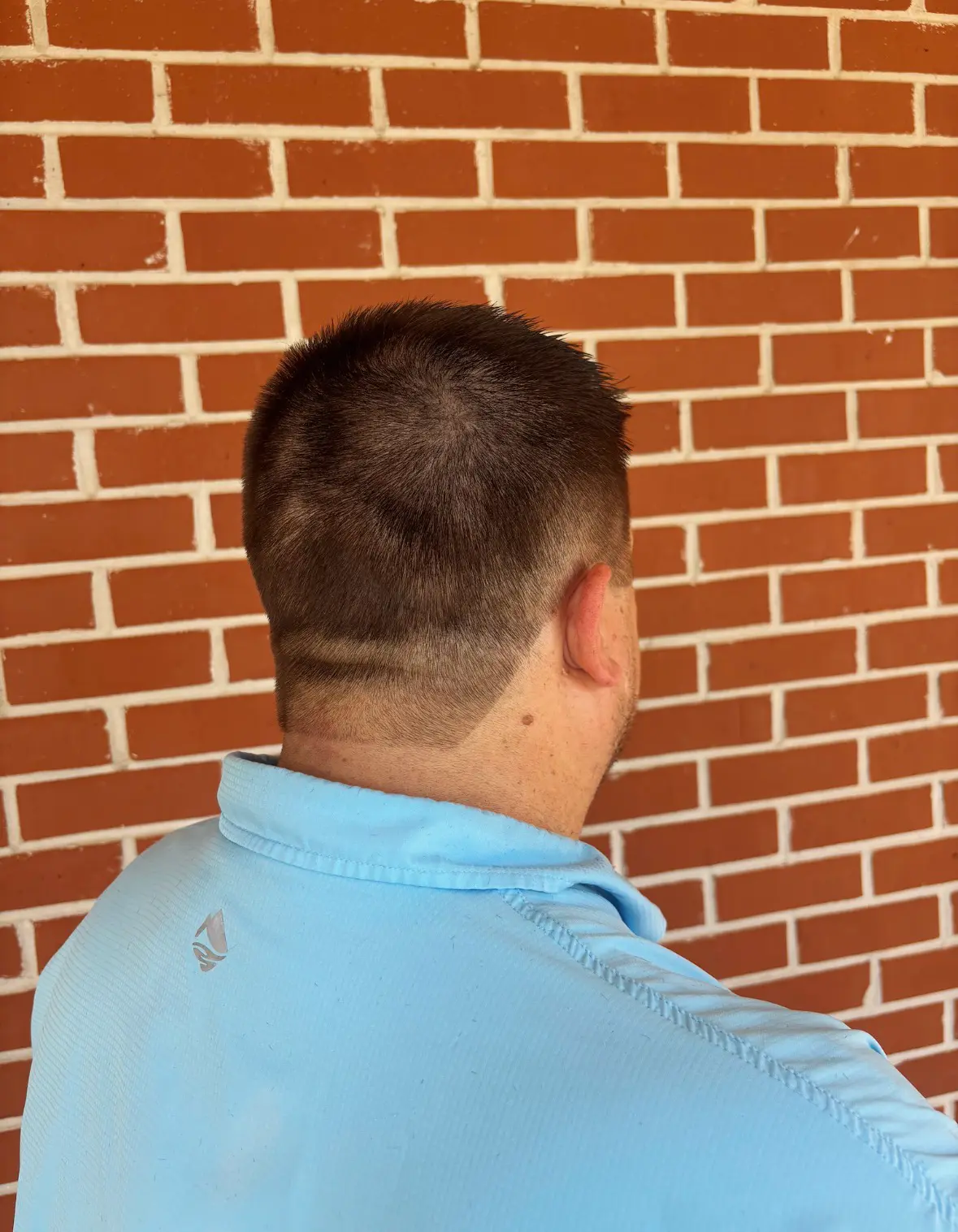 Men's fade haircut by Olivia