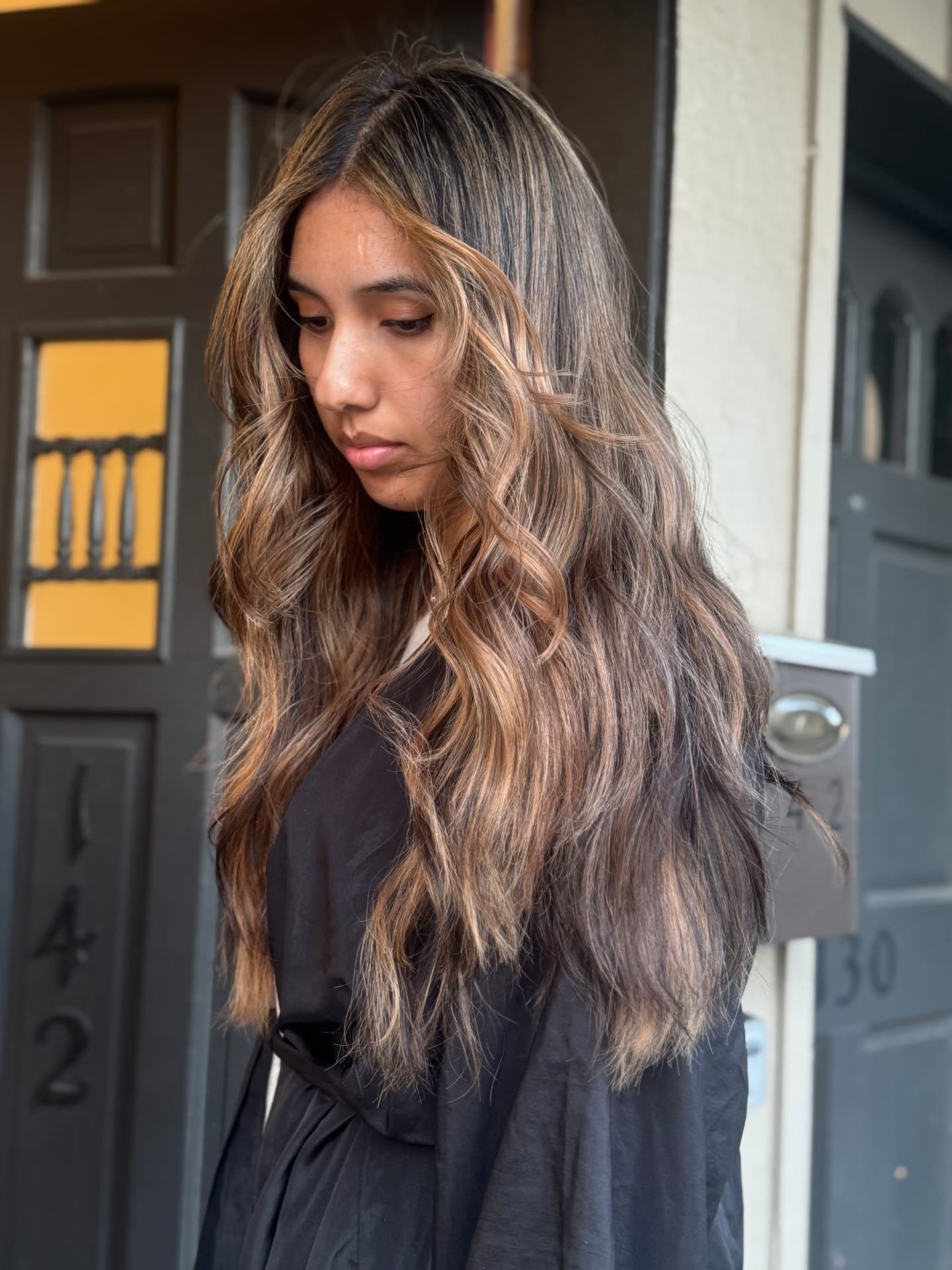 Brunette with caramel highlights by Haley